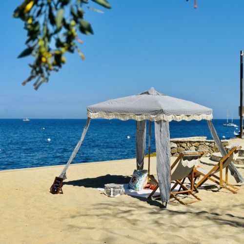 Unwind in a cozy, shaded cabana with a front row seat to the sparkling sea and golden sands.