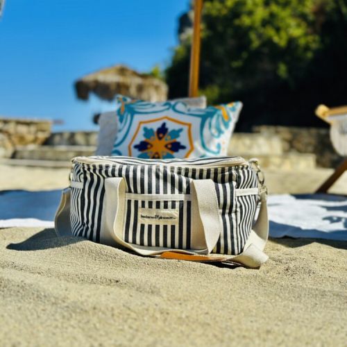 Stylish and beach ready, this striped cooler bag is your go-to for a perfect day by the waves.