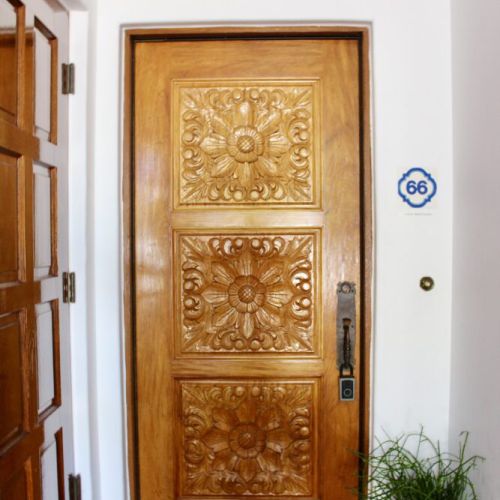 Enter through a beautifully hand carved wooden door that sets the tone for your stay.