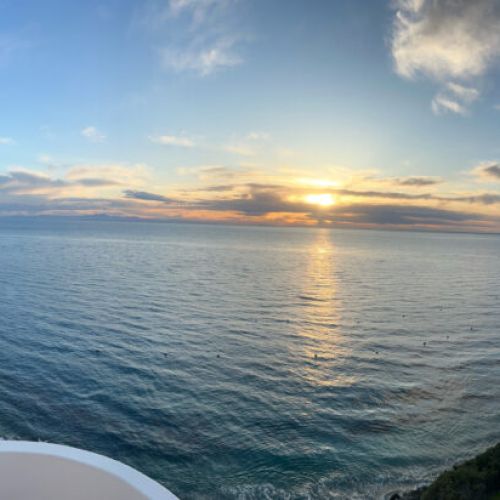 - Wake up or wind down with sweeping views of the Pacific from your balcony
- Watch the golden sun dip below the horizon with nothing but water in sight
- Peaceful cliffs, palm trees, and gentle waves complete this postcard perfect escape